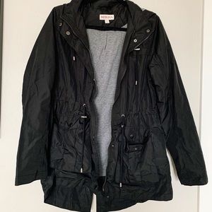 Black hooded rain jacket